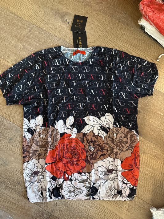 Áo montoghi hoạ tiết chữ V bông hoa cam nâu gấu áo 6824