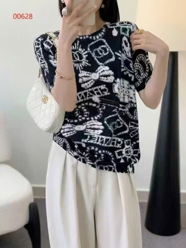 Áo montoghi hoạ tiết đen phối trắng CC 6829