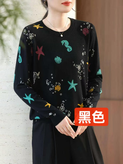 Áo Montoghi chui cổ dài tay hoạ tiết sao biển màu Xanh Than