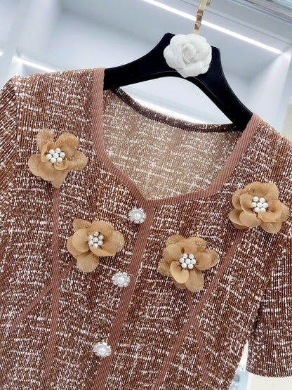 Đầm thun nhún đính bông hoa ngọc trai màu nâu 6053