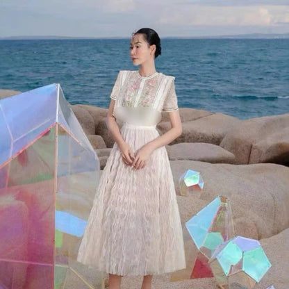 Đầm ren tiểu thư thêu hoa ngực tà bèo siêu đẹp 6044